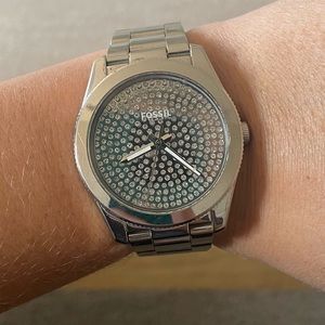 Silver fossil watch